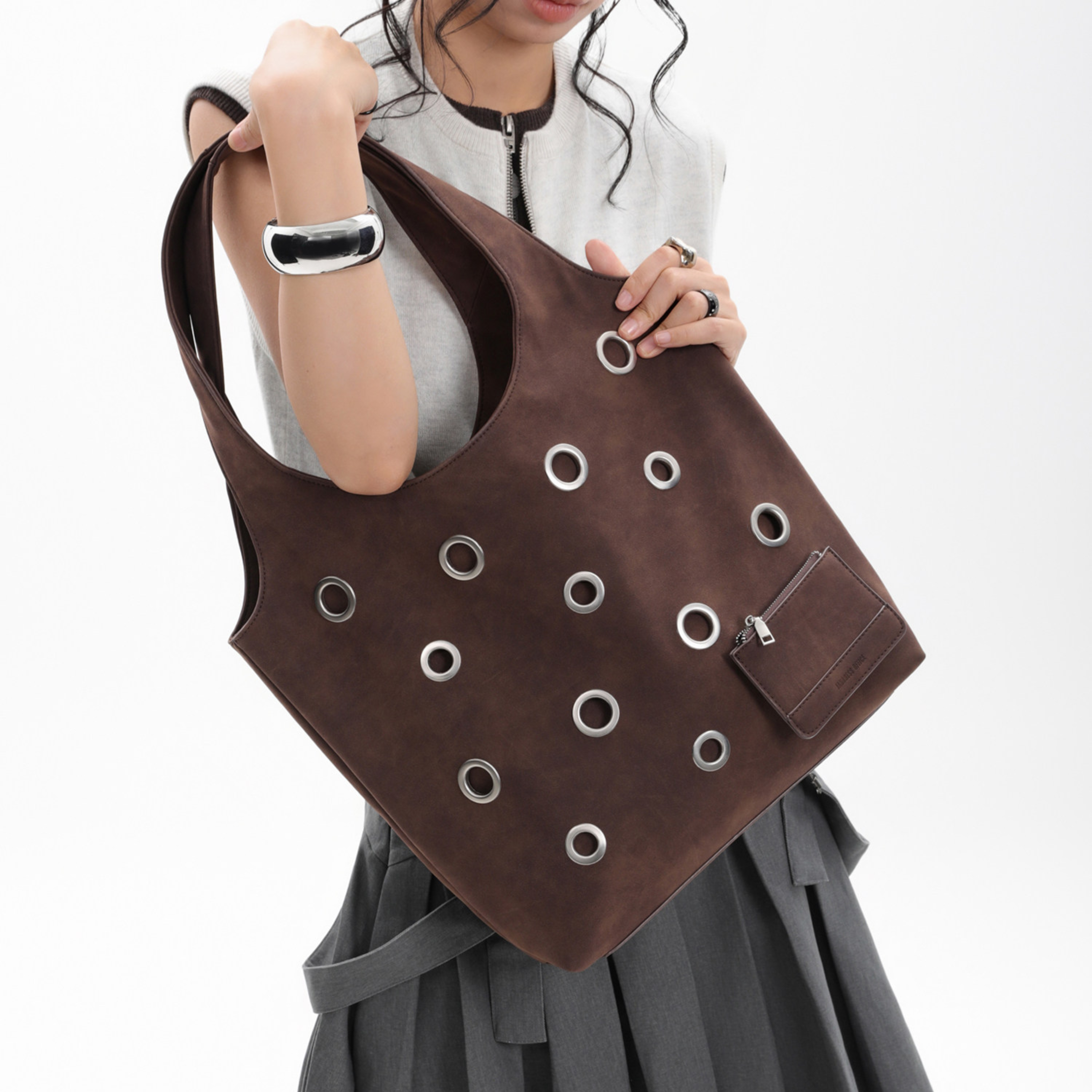 DISTRESSED EYELET TOTE BAG