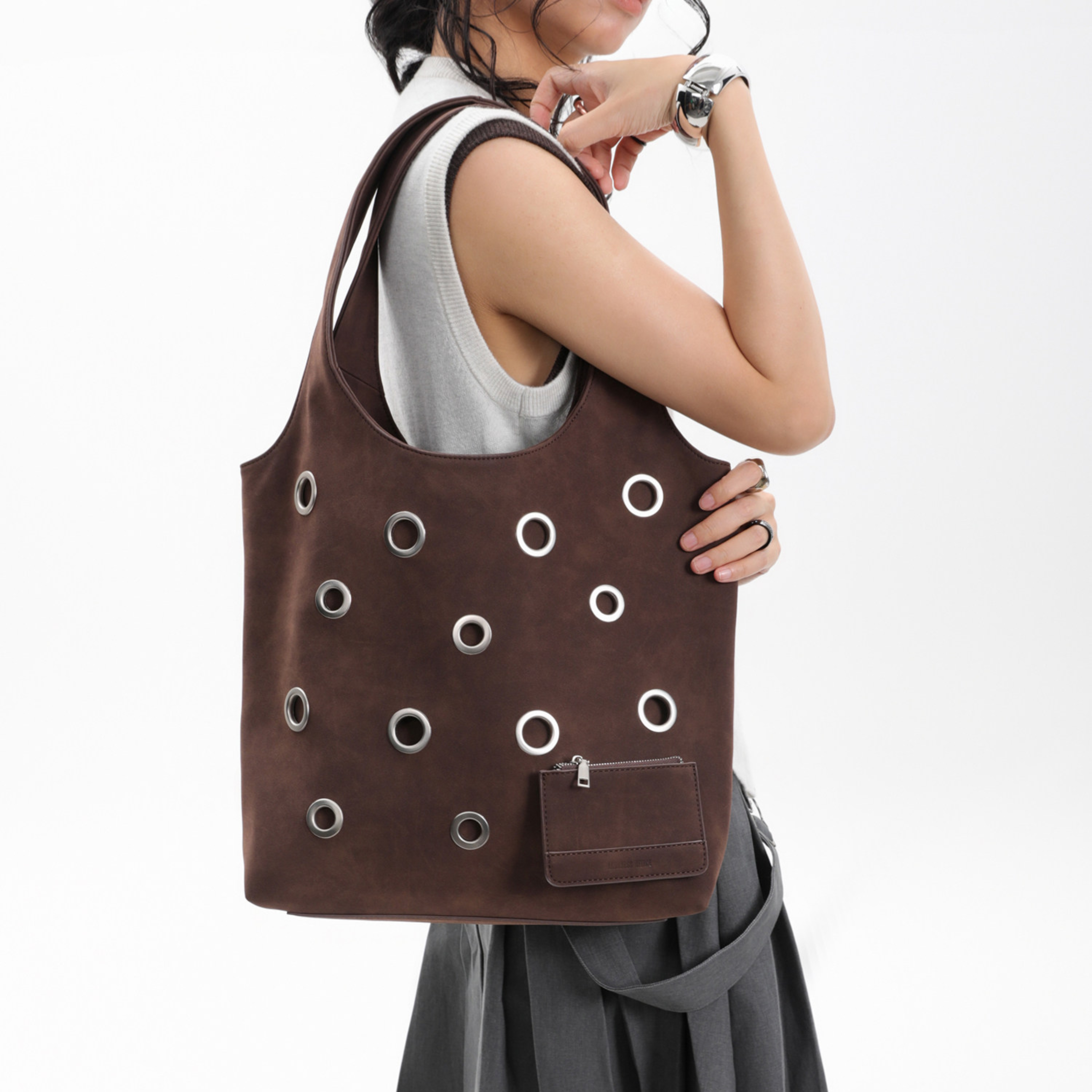 DISTRESSED EYELET TOTE BAG