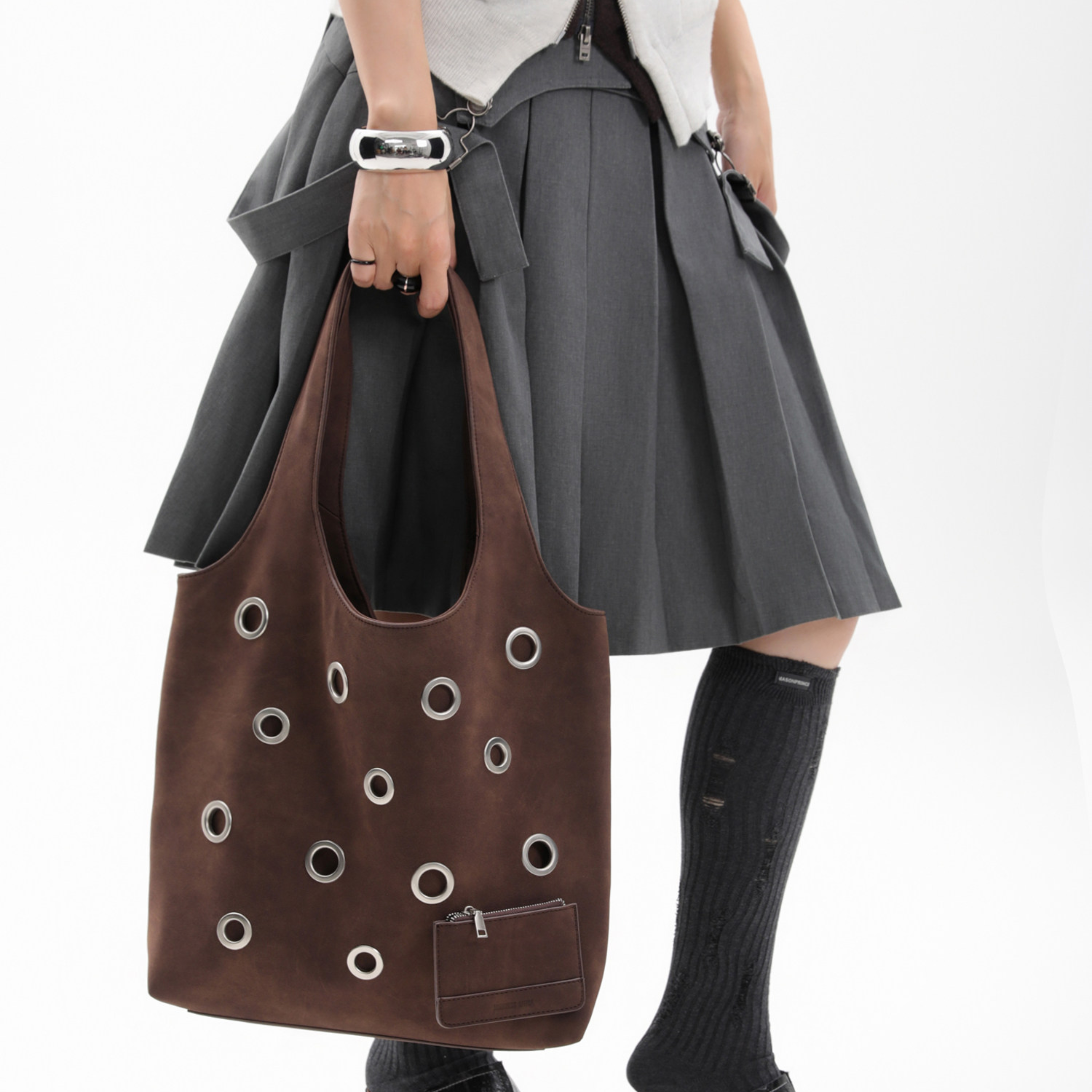 DISTRESSED EYELET TOTE BAG