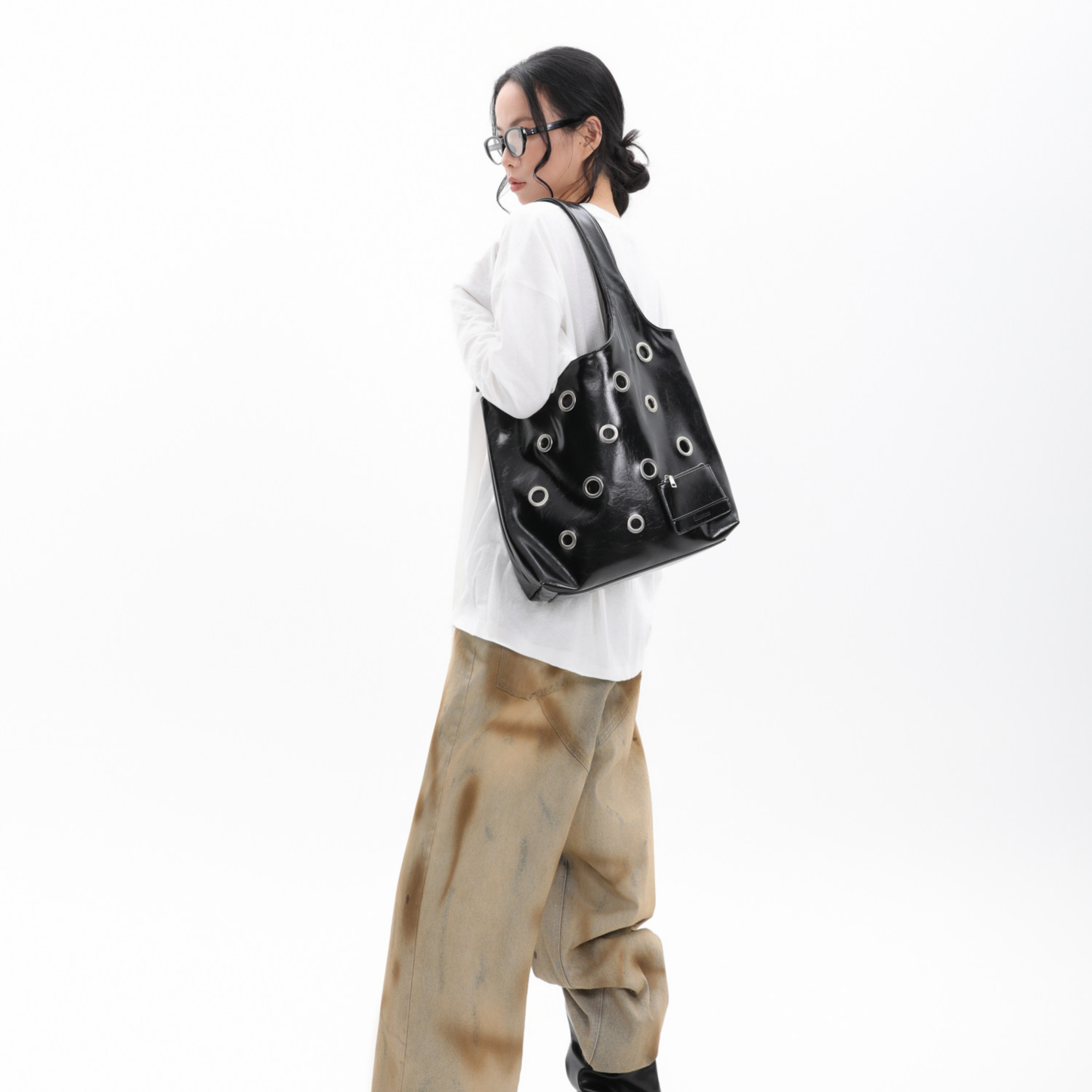 DISTRESSED EYELET TOTE BAG
