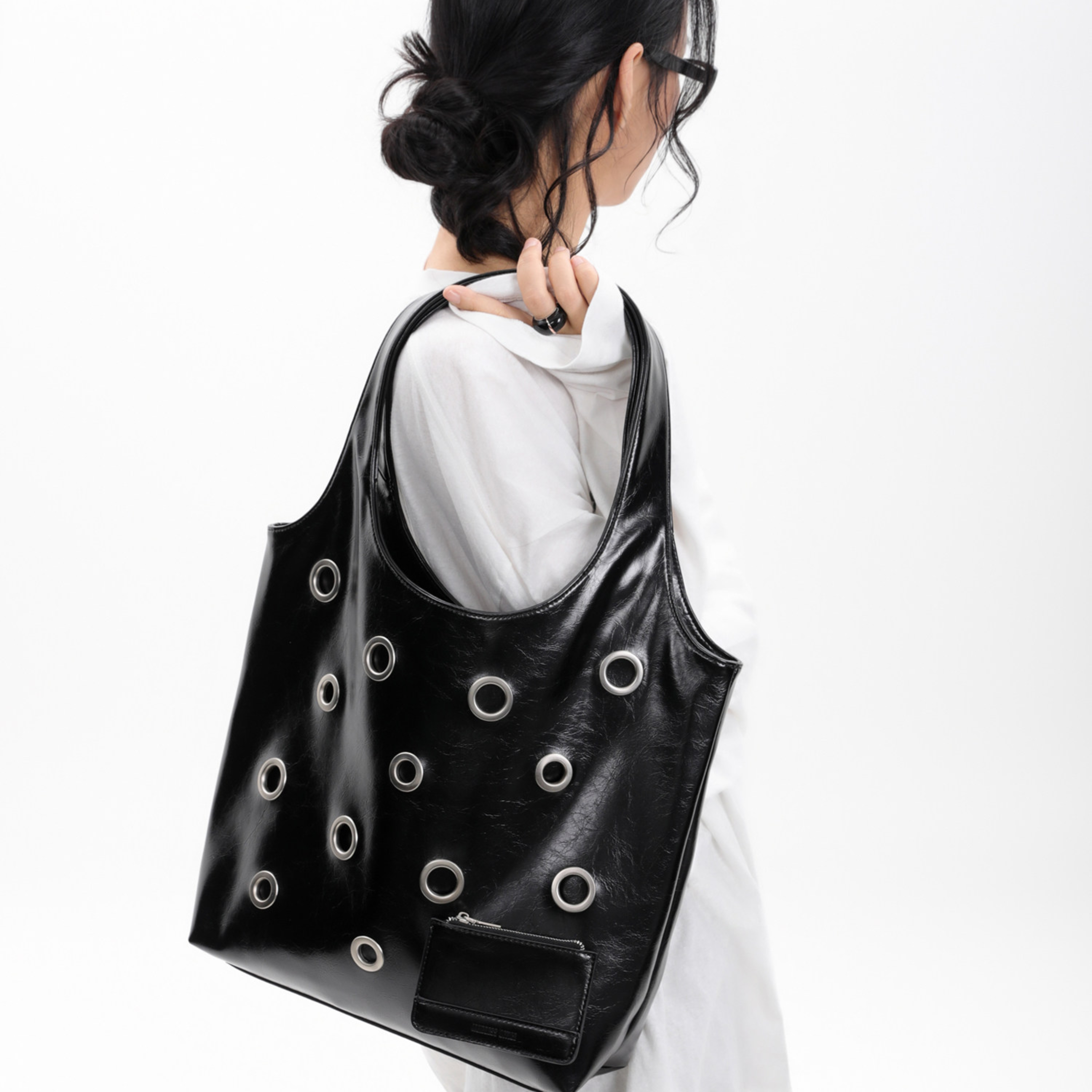DISTRESSED EYELET TOTE BAG